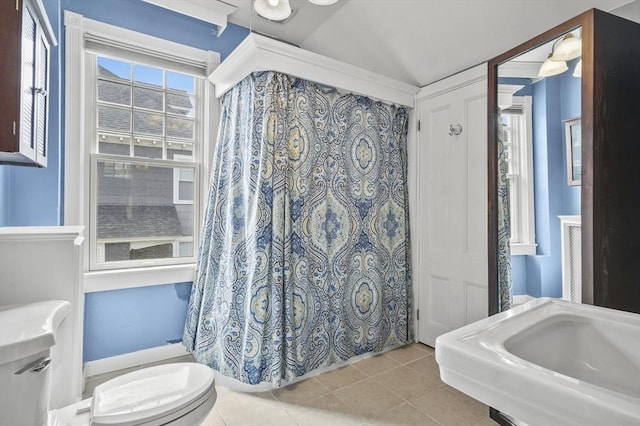 30 Wentworth Ave, Lowell, MA 01852 - full bath with toilet and tile patterned floors