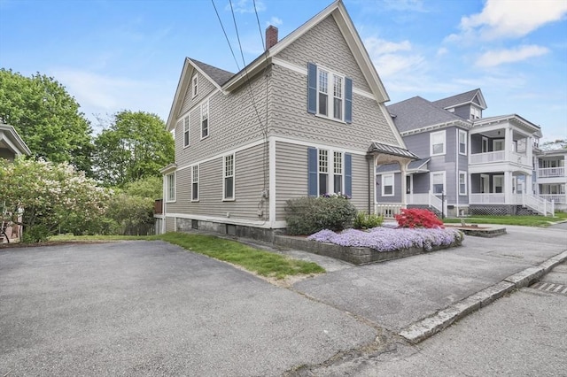 30 Wentworth Ave, Lowell, MA 01852 - view of front of property featuring a chimney