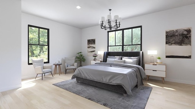 1 Marion St Unit Ph1, Cambridge, MA 02141 - bedroom with a chandelier, light wood finished floors, and baseboards