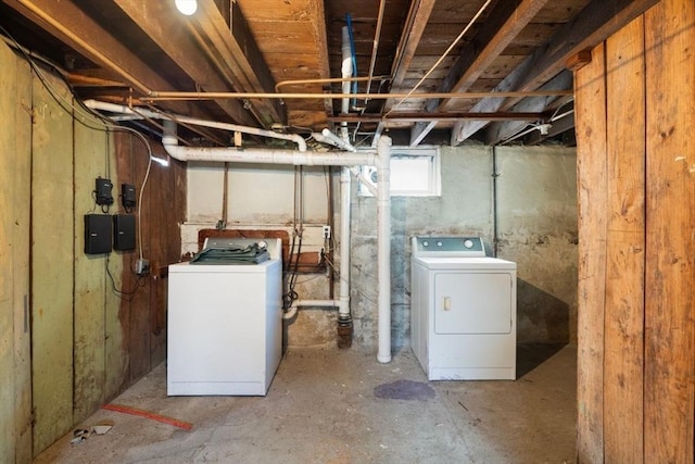 basement with washing machine and clothes dryer