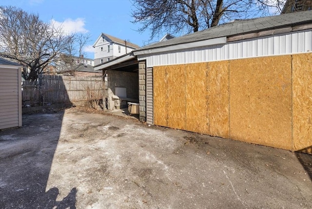 view of property exterior featuring fence