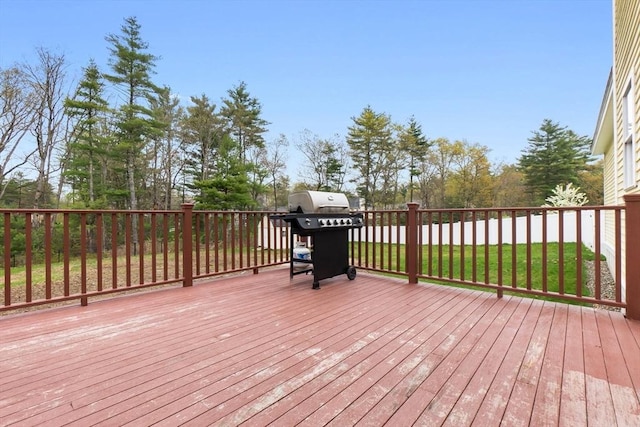 wooden deck with area for grilling