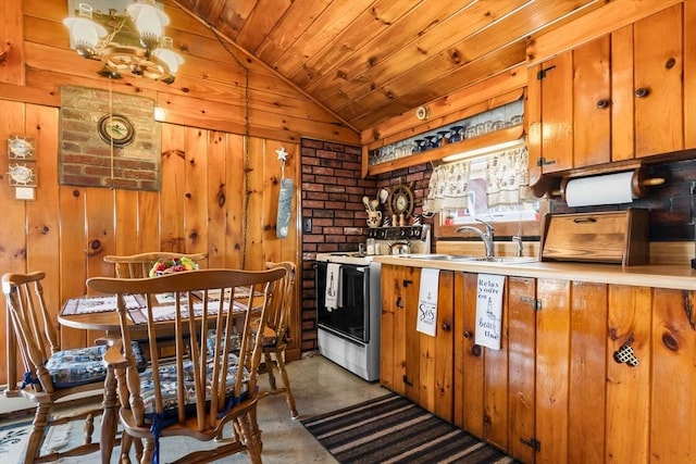 kitchen featuring a sink, range with electric cooktop, brown cabinetry, lofted ceiling, and wood ceiling