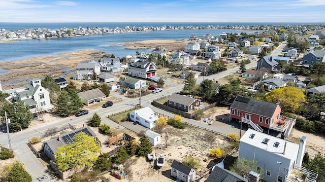 aerial view with a water view and a residential view