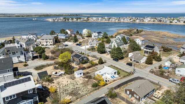 aerial view with a residential view and a water view