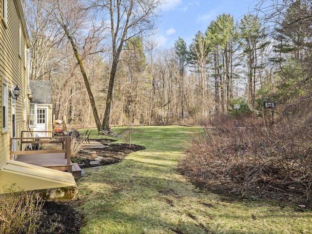 view of yard featuring a deck