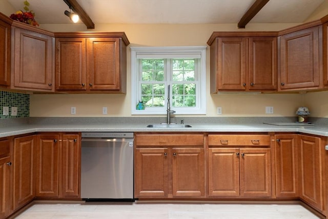 300 Henshaw St, Leicester, MA 01524 - kitchen with dishwasher, brown cabinetry, track lighting, and light countertops