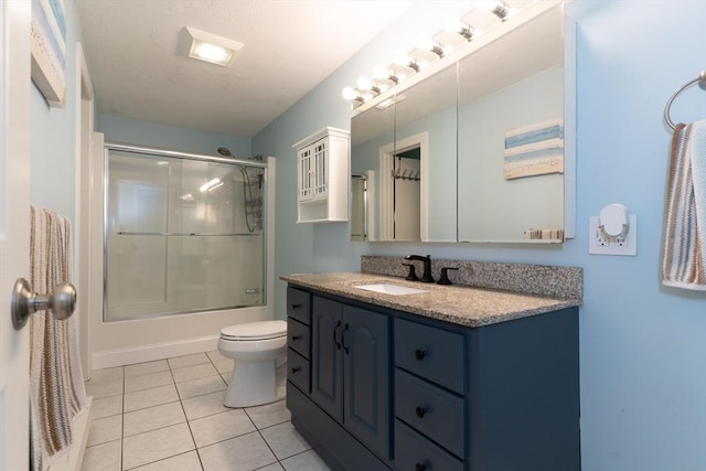 300 Henshaw St, Leicester, MA 01524 - bathroom with vanity, tile patterned flooring, and bath / shower combo with glass door
