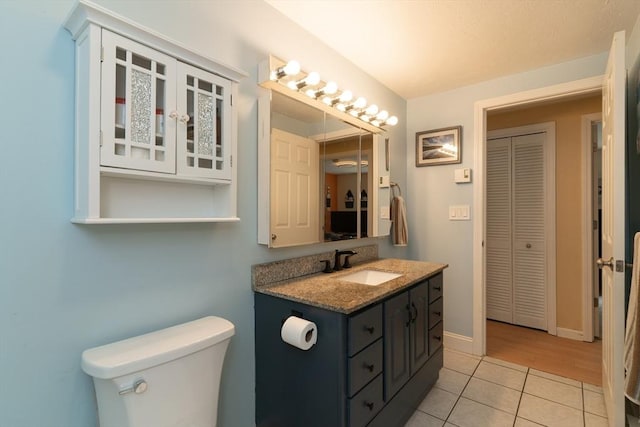 300 Henshaw St, Leicester, MA 01524 - bathroom featuring vanity, tile patterned flooring, and a closet
