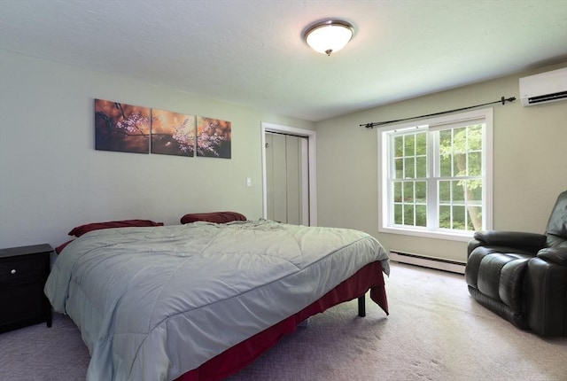 300 Henshaw St, Leicester, MA 01524 - carpeted bedroom with baseboard heating, a wall unit AC, and a closet