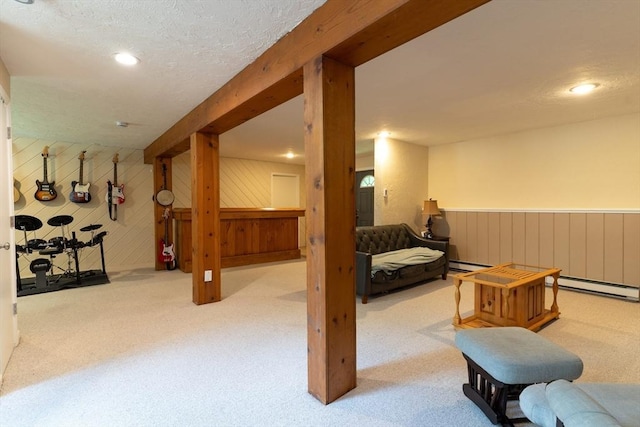 300 Henshaw St, Leicester, MA 01524 - living room with carpet floors, recessed lighting, wooden walls, and a baseboard heating unit