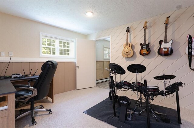 300 Henshaw St, Leicester, MA 01524 - carpeted home office featuring a baseboard radiator, wooden walls, and a textured ceiling