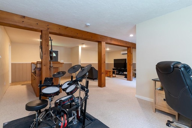 300 Henshaw St, Leicester, MA 01524 - workout area with light colored carpet, a textured ceiling, a wall mounted air conditioner, a wainscoted wall, and recessed lighting