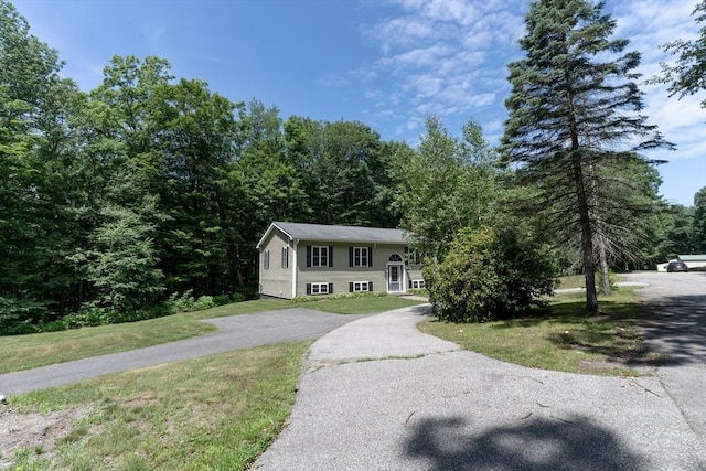 300 Henshaw St, Leicester, MA 01524 - bi-level home with a front yard and driveway