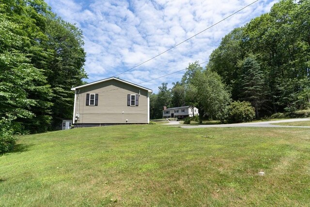 300 Henshaw St, Leicester, MA 01524 - view of side of home featuring a lawn
