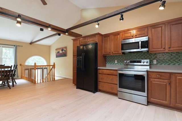 300 Henshaw St, Leicester, MA 01524 - kitchen with appliances with stainless steel finishes, track lighting, and brown cabinetry