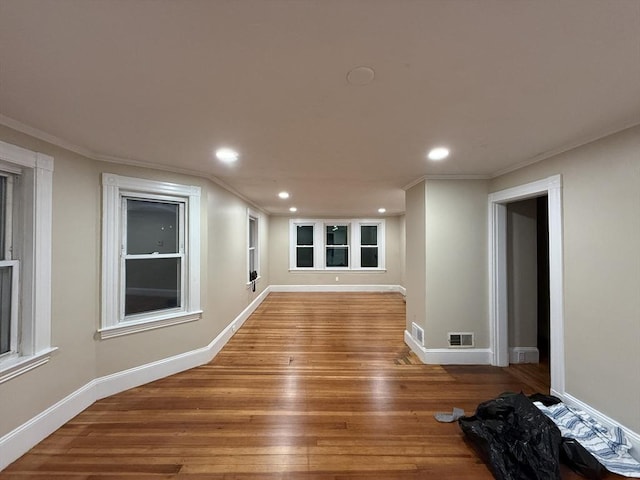 9-11 Elson Rd, Waltham, MA 02451 - spare room featuring recessed lighting, crown molding, and wood finished floors