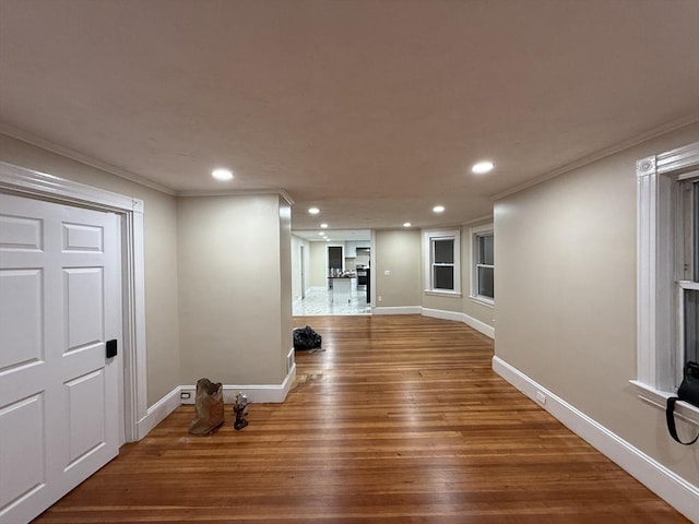 9-11 Elson Rd, Waltham, MA 02451 - foyer entrance featuring ornamental molding, recessed lighting, and wood finished floors