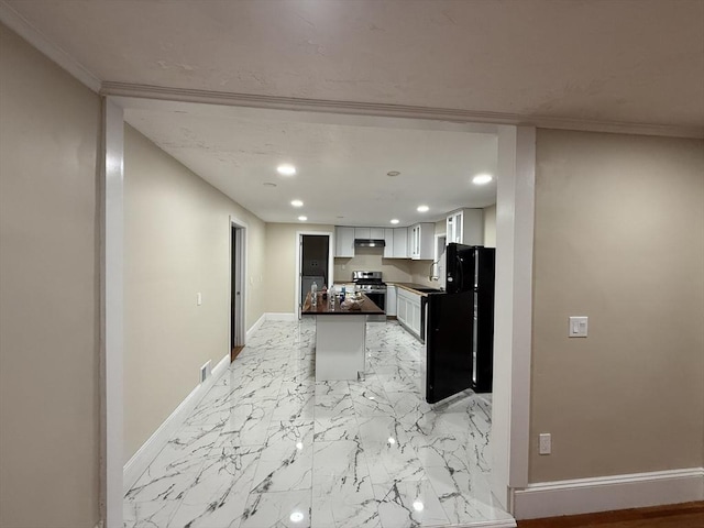 9-11 Elson Rd, Waltham, MA 02451 - kitchen with recessed lighting, freestanding refrigerator, dark countertops, white cabinets, and light marble finish floors