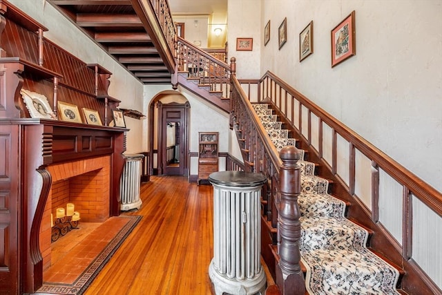 26 S Main St, Belchertown, MA 01007 - stairs with arched walkways and wood finished floors
