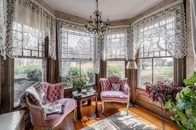 26 S Main St, Belchertown, MA 01007 - sunroom with a chandelier and hardwood / wood-style floors