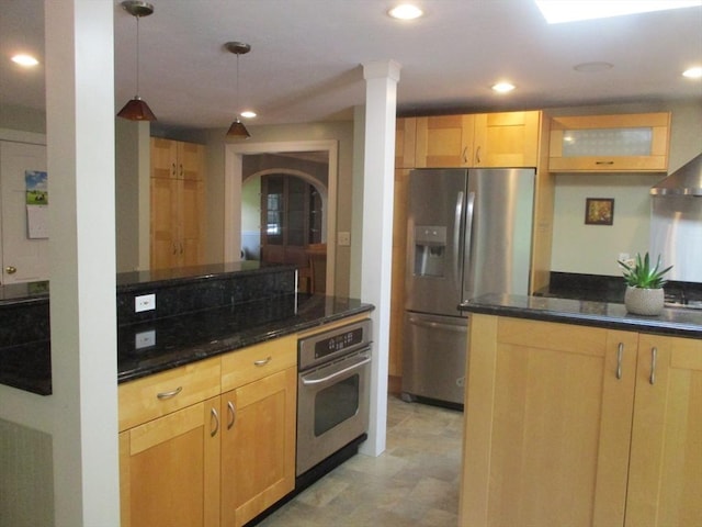 4 Deepwater Ln, Walpole, MA 02091 - kitchen with stainless steel appliances, glass insert cabinets, dark stone counters, recessed lighting, and hanging light fixtures