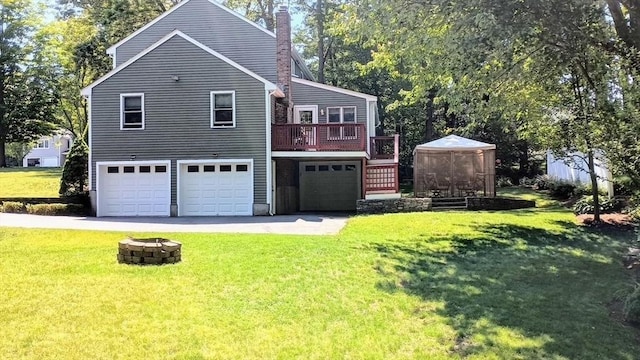 4 Deepwater Ln, Walpole, MA 02091 - view of side of property featuring a garage, a yard, and a chimney