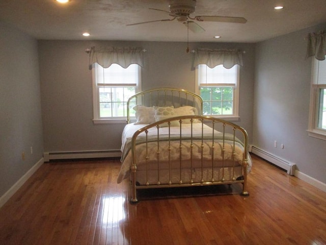 4 Deepwater Ln, Walpole, MA 02091 - bedroom with baseboard heating, multiple windows, wood finished floors, and recessed lighting