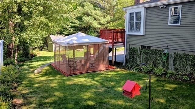 4 Deepwater Ln, Walpole, MA 02091 - view of green lawn featuring a gazebo and a wooden deck