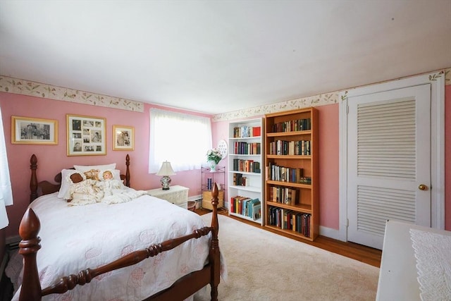 bedroom featuring baseboards
