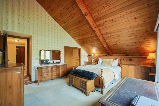 carpeted bedroom with wallpapered walls, lofted ceiling with beams, and wooden ceiling