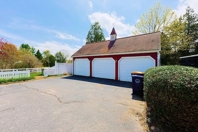 detached garage with fence