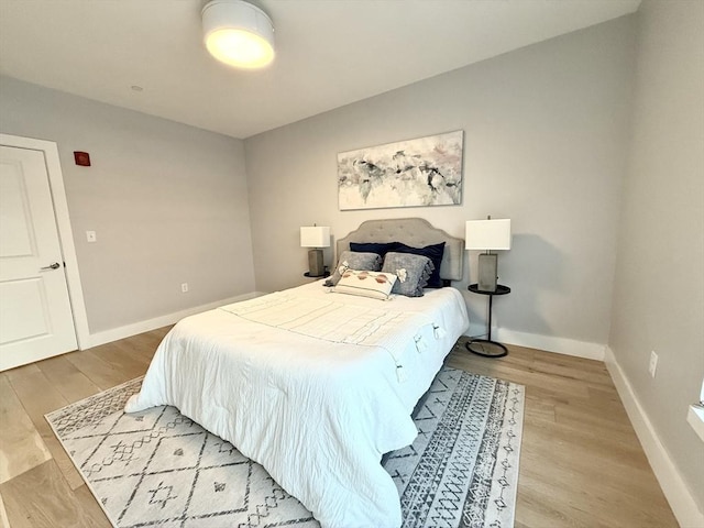 bedroom featuring light wood-type flooring