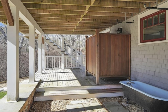 view of patio featuring stairway