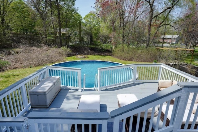 outdoor pool with a deck