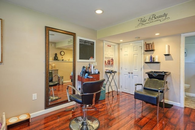 sitting room featuring recessed lighting, baseboards, and wood finished floors