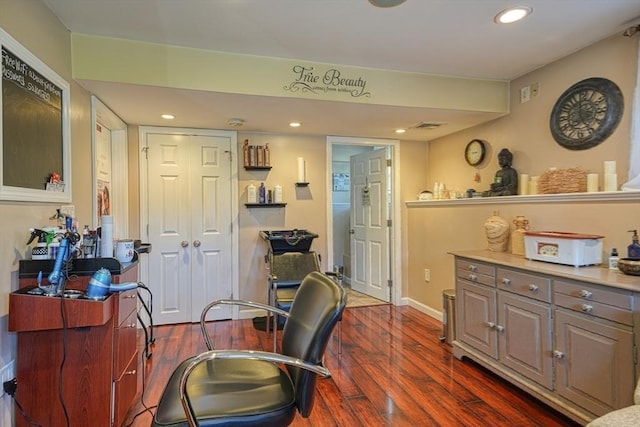 home office featuring recessed lighting, baseboards, dark wood finished floors, and visible vents