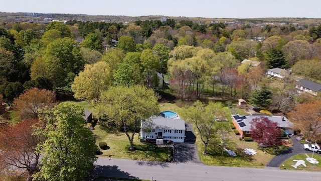 bird's eye view with a forest view
