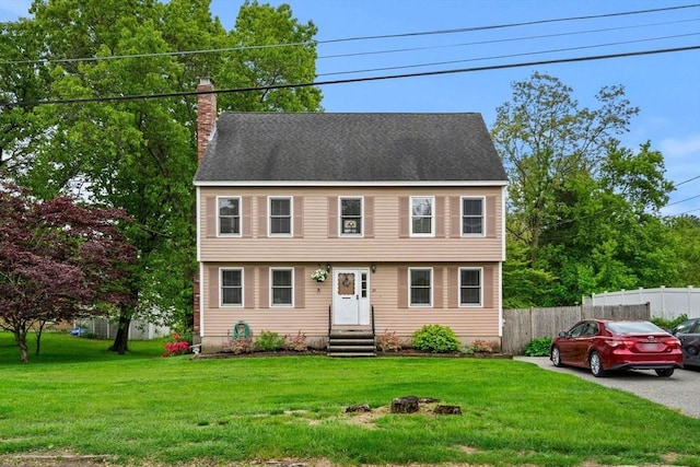 24 Floyd Ave, Tewksbury, MA 01876 - colonial home featuring a chimney