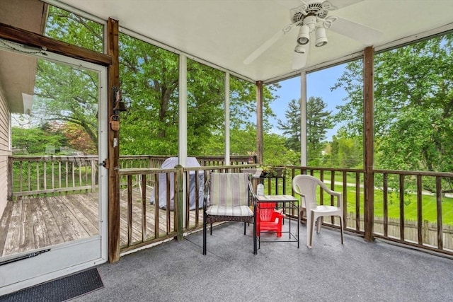 24 Floyd Ave, Tewksbury, MA 01876 - sunroom featuring ceiling fan and view of wooded area