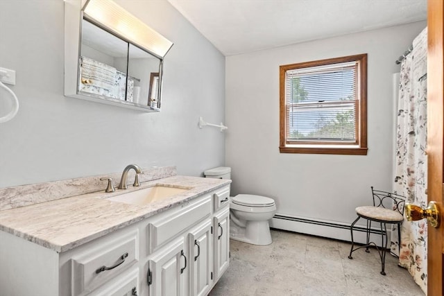 24 Floyd Ave, Tewksbury, MA 01876 - full bathroom featuring a baseboard heating unit, vanity, and toilet