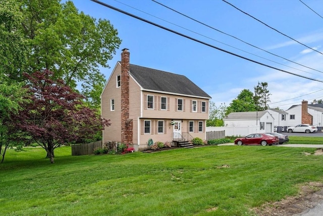 24 Floyd Ave, Tewksbury, MA 01876 - colonial house featuring a chimney