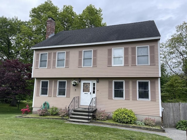 24 Floyd Ave, Tewksbury, MA 01876 - colonial-style house featuring a chimney