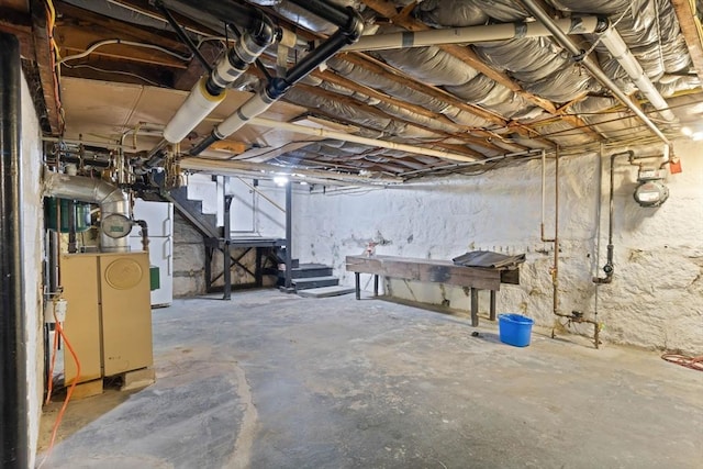 unfinished basement featuring stairway