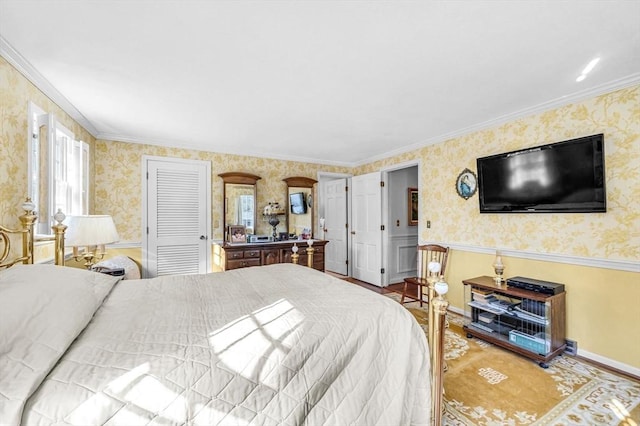 bedroom with ornamental molding and hardwood / wood-style floors