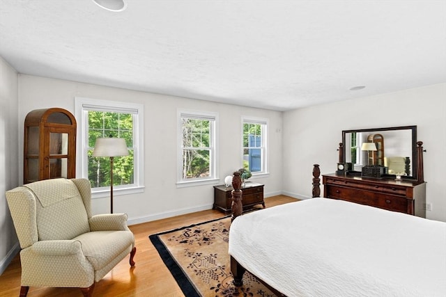 70 Humphreys Ln Unit 70, Duxbury, MA 02332 - bedroom with light wood finished floors and baseboards