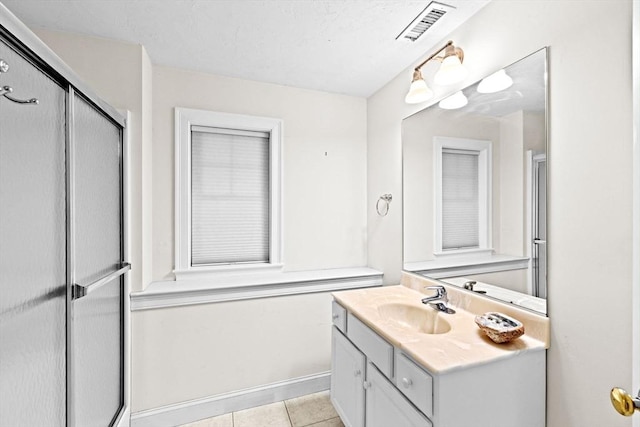 70 Humphreys Ln Unit 70, Duxbury, MA 02332 - bathroom with vanity, a shower stall, and tile patterned floors