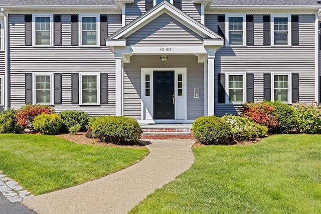70 Humphreys Ln Unit 70, Duxbury, MA 02332 - property entrance with a yard