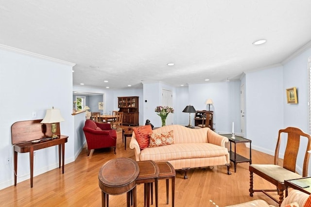 70 Humphreys Ln Unit 70, Duxbury, MA 02332 - living room with crown molding, baseboards, light wood-style floors, and recessed lighting