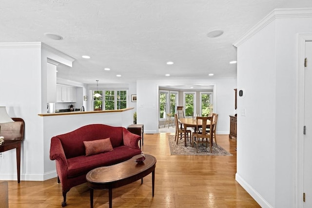 70 Humphreys Ln Unit 70, Duxbury, MA 02332 - living area with recessed lighting, light wood-style flooring, baseboards, and a textured ceiling
